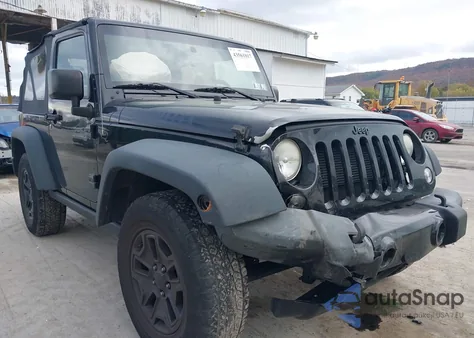 2014 Jeep Wrangler Willys Wheeler z USA, uszkodzony, nr VIN 1C4AJWAG9EL327728